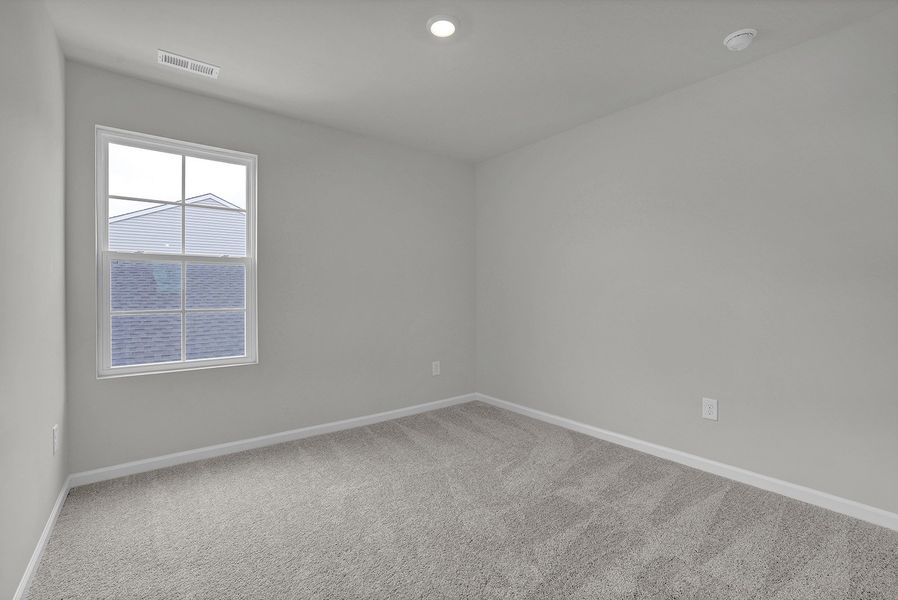 Spacious, unfurnished interior of a new home in River Tide Farms, Bolivia (Image 21).