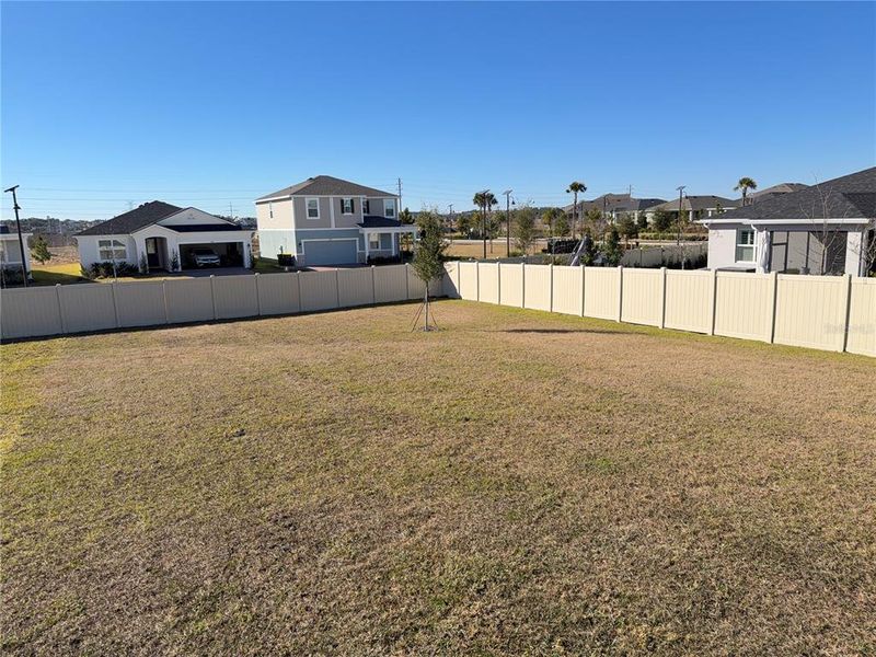 Exterior details and patio area of a home in Waterbrooke, Clermont (Image 3).