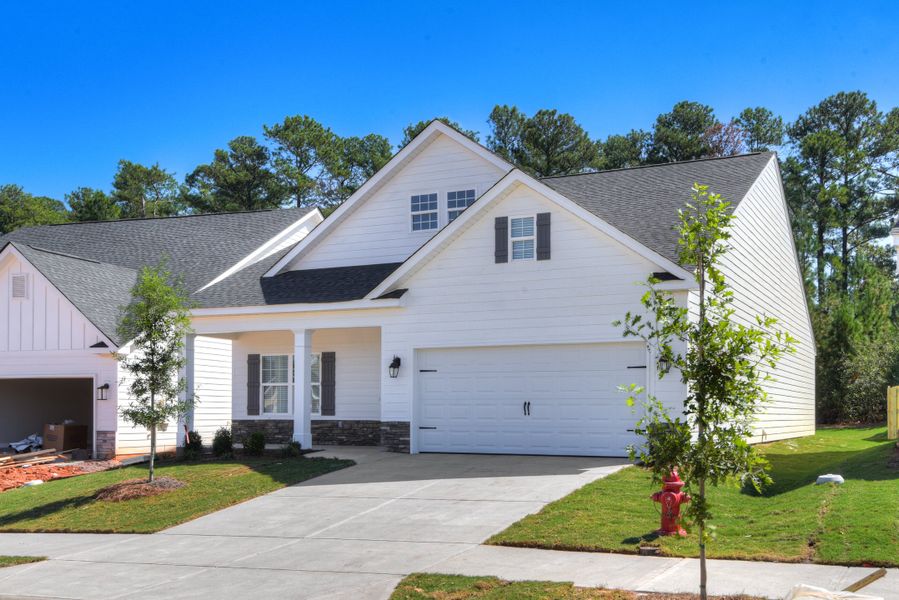 Front exterior of a new home in The Sanctuary, Aiken, SC, highlighting curb appeal (Image 2). Front exterior of a new home in The Sanctuary, Aiken, SC, highlighting curb appeal (Image 2).