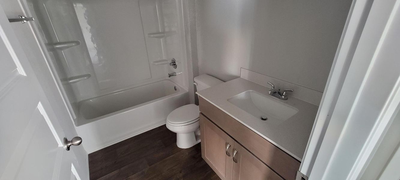 Furnished interior view inside a new home in Cloverleaf, Austin (Image 9).