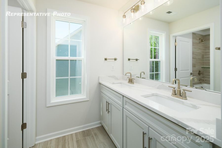 Furnished interior view inside a new home in Sylvan Creek, Denver (Image 2).