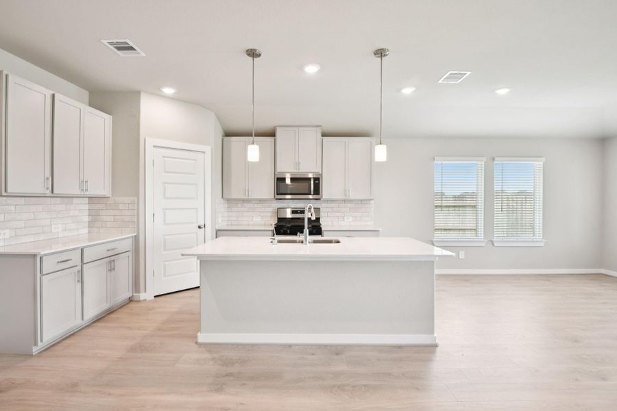 Photo is not of the actual home, but is an inspirational photo of builder’s model home and may depict options, furnishings, and/or decorator features that are not included