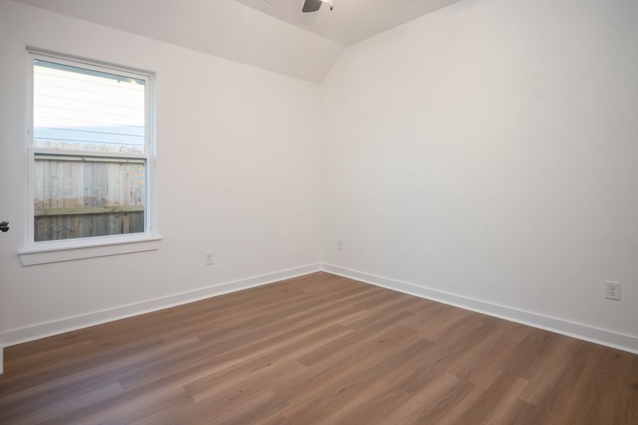 Representative unfurnished interior of a home built from the The Rose by Avonley Homes in Pinemont, Bryan (Image 26).