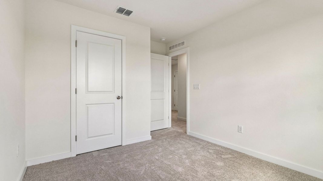 Furnished interior view inside a new home in Cyrene at Harmony, St. Cloud (Image 34).