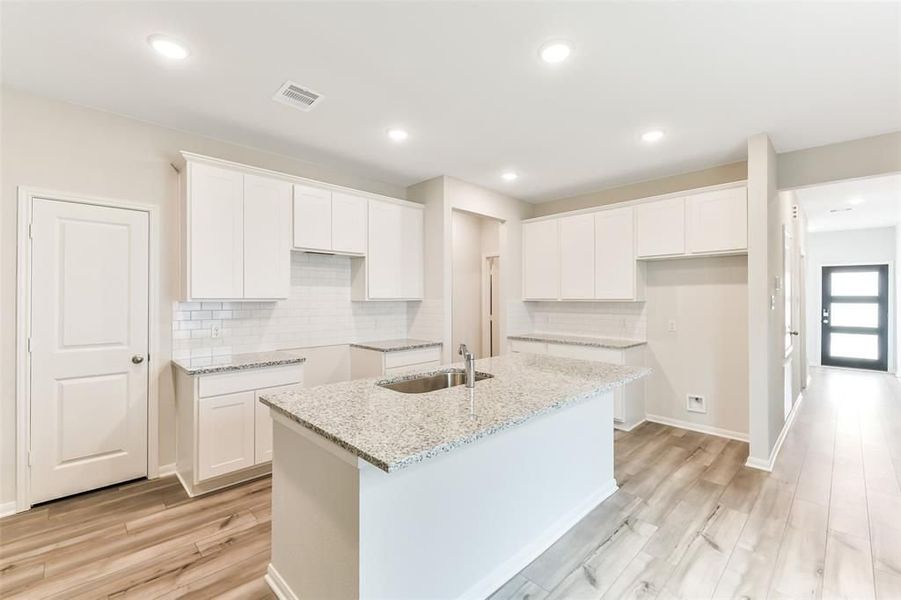 Furnished interior view inside a new home in Caney Creek Place, Conroe (Image 35).