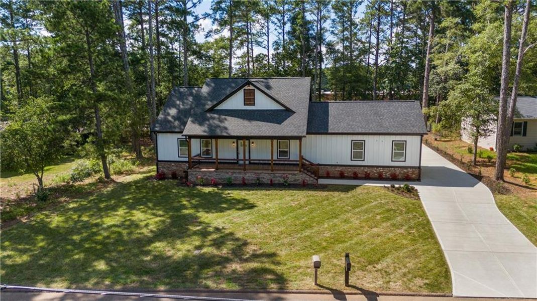 Front exterior of a new home in , Monroe, GA, highlighting curb appeal (Image 32). Front exterior of a new home in , Monroe, GA, highlighting curb appeal (Image 32).