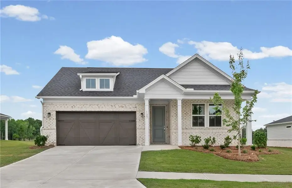 Front exterior of a new home in Overland, Locust Grove, GA, highlighting curb appeal (Image 1). Front exterior of a new home in Overland, Locust Grove, GA, highlighting curb appeal (Image 1).