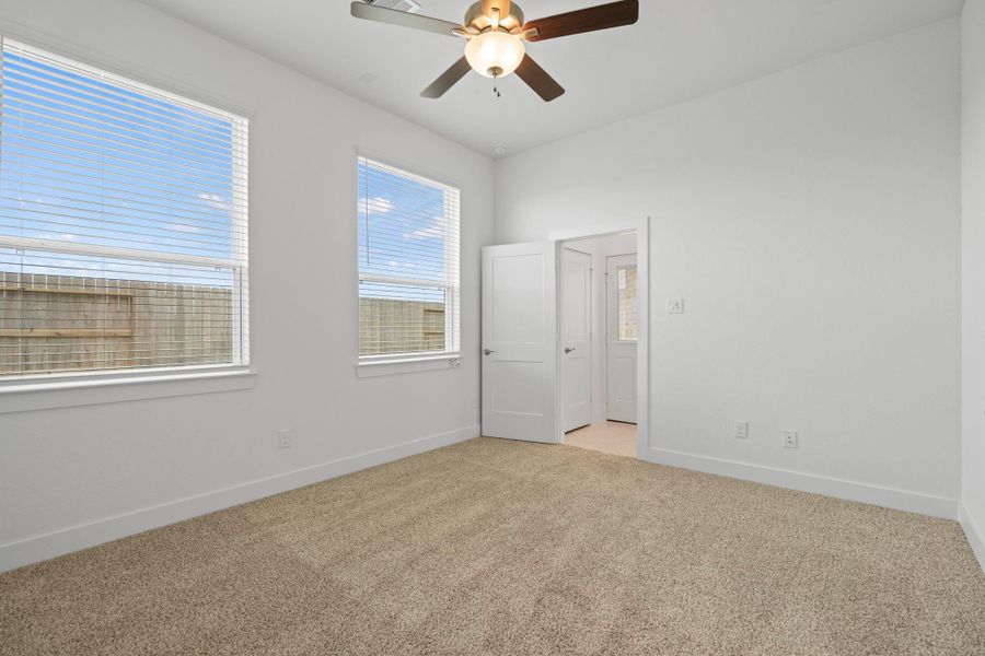 Spacious, unfurnished interior of a new home in Sunterra, Katy (Image 17).