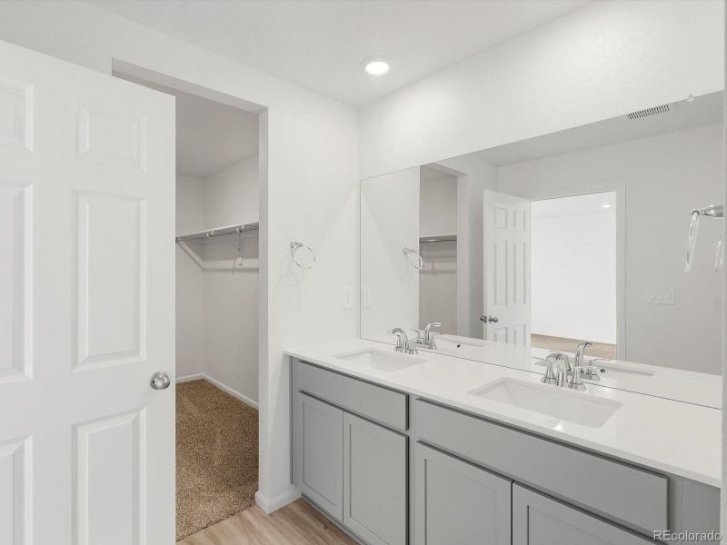 Furnished interior view inside a new home in Skyview at High Point, Aurora (Image 14).