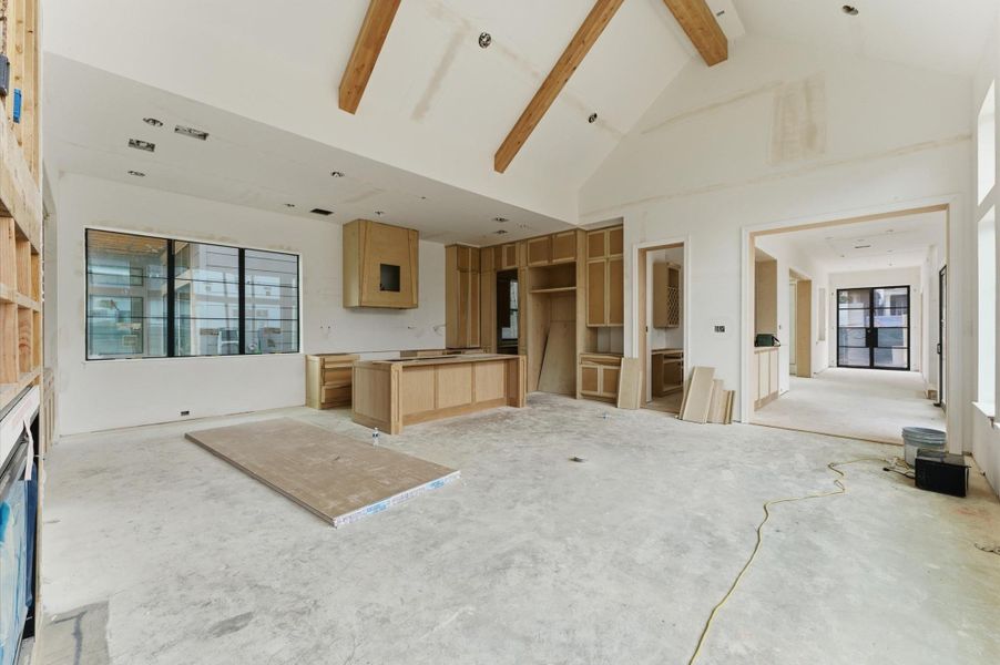 Living area leads to the bar, butler's pantry and front door.