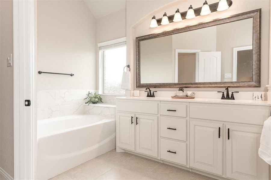 Private Primary Bathroom with cusom vanity and lighting