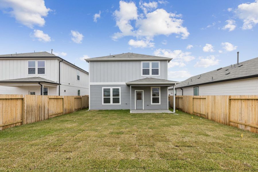 Exterior details and patio area of a home in Decker Farms, Magnolia (Image 2).