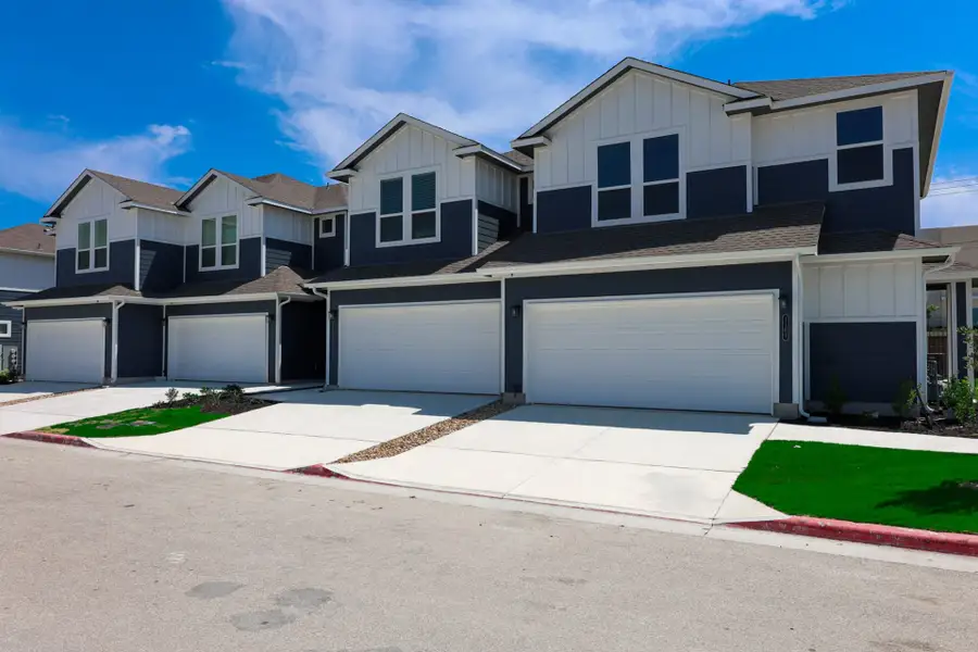 Front exterior of a new home in Center 45, Round Rock, TX, highlighting curb appeal (Image 2).