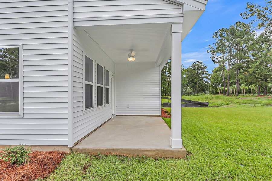 Exterior details and patio area of a home in Fairway Woods at Wyboo, Manning (Image 4).