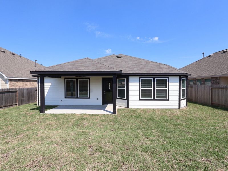 Exterior details and patio area of a home in Magnolia Ridge, Magnolia (Image 4).