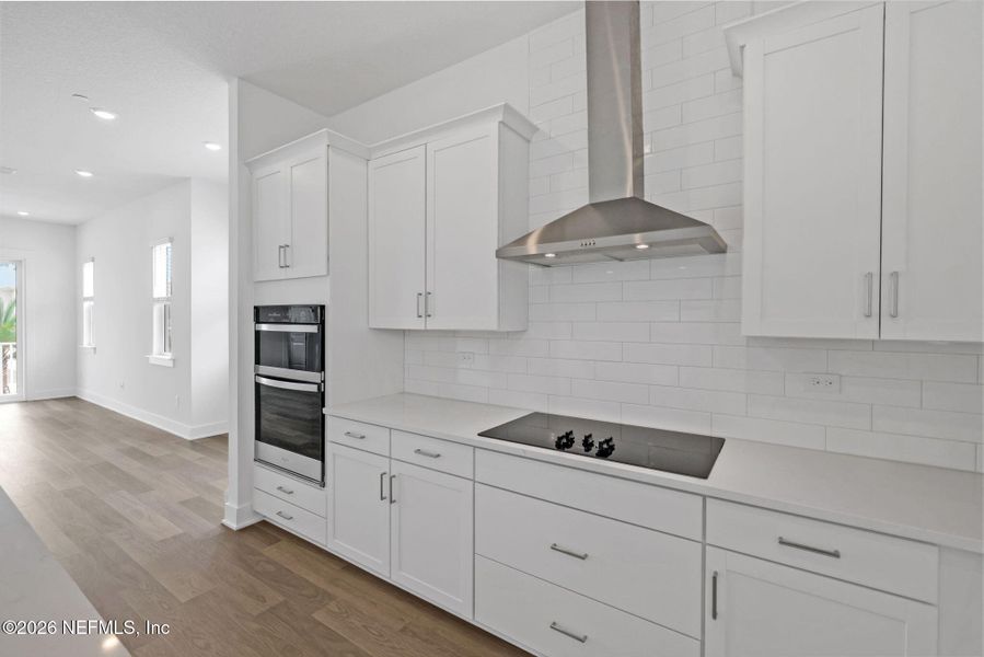 Furnished interior view inside a new home in North Beach Townhomes, Jacksonville Beach (Image 4).