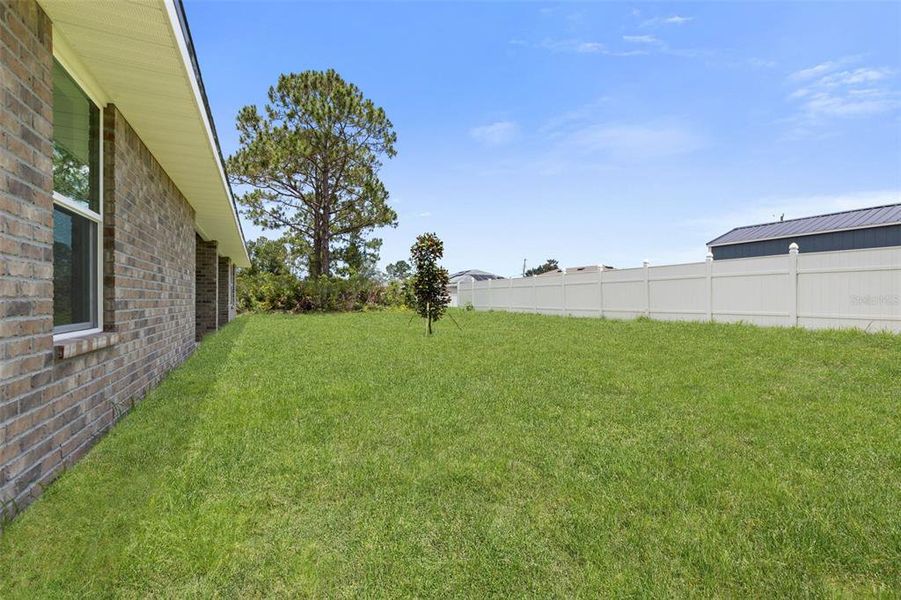 Exterior details and patio area of a home in , Palm Coast (Image 33).