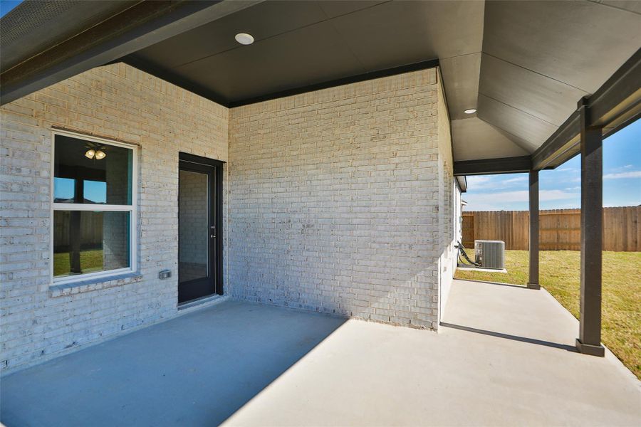 Exterior details and patio area of a home in River Ranch, Dayton (Image 3).