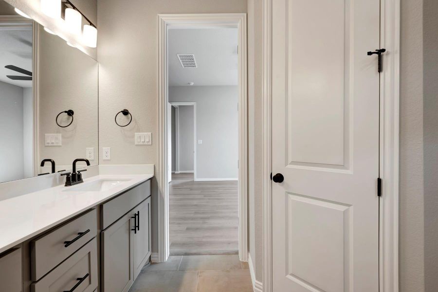 Furnished interior view inside a new home in Heritage, Dripping Springs (Image 9).