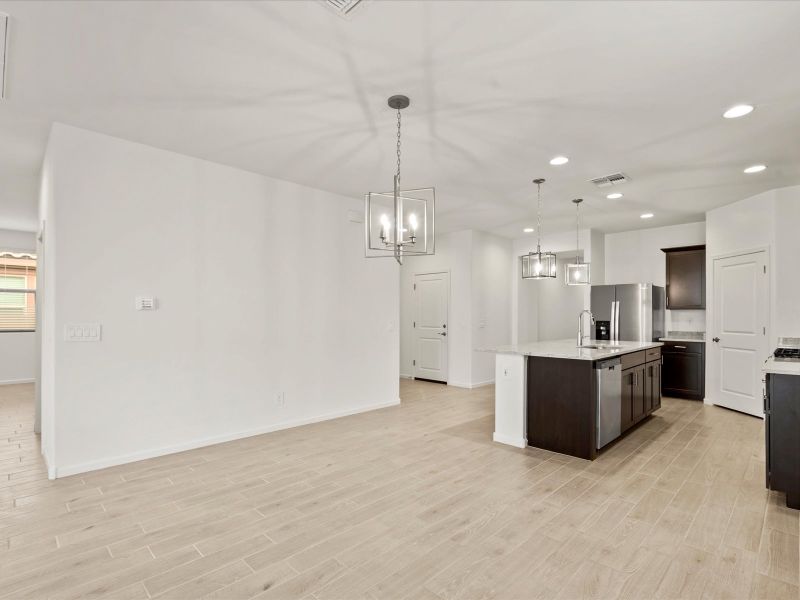 Spacious, unfurnished interior of a new home in Mandarina - Premier Series, Marana (Image 11).