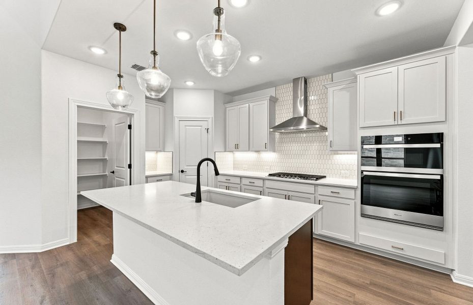 Furnished interior view inside a new home in Bluffview Reserve, Leander (Image 11).