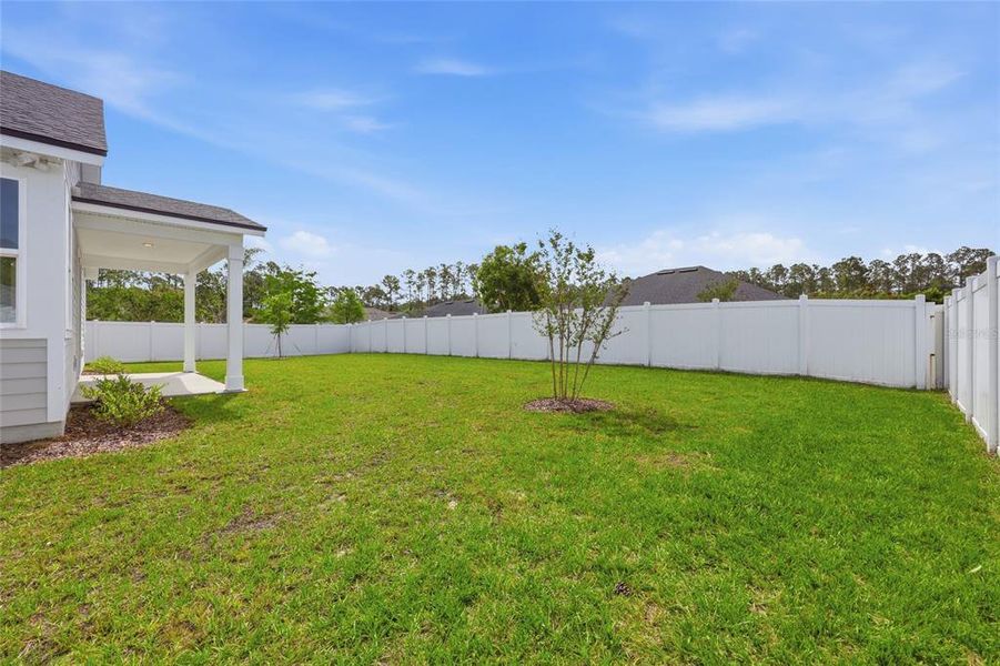Exterior details and patio area of a home in Palm Coast Homes, Palm Coast (Image 30).