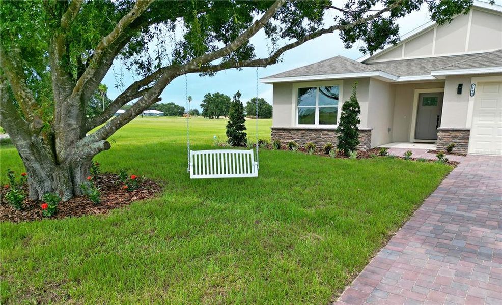 Front exterior of a new home in , Sebring, FL, highlighting curb appeal (Image 23). Front exterior of a new home in , Sebring, FL, highlighting curb appeal (Image 23).
