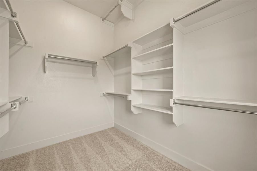 This dream owners closet comes complete with seasonal hanging racks and plenty of space for all your treasures!