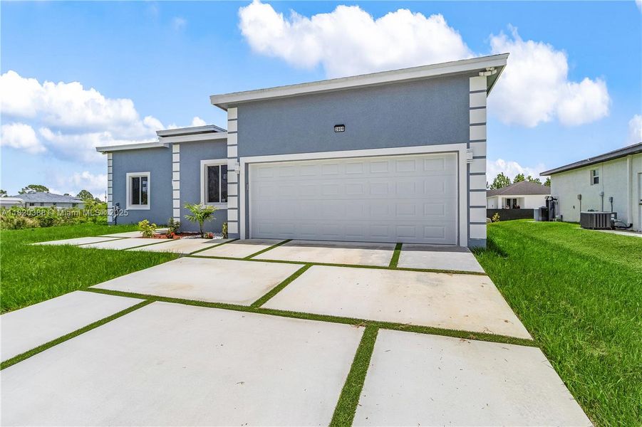 Exterior details and patio area of a home in , Lehigh Acres (Image 3). Exterior details and patio area of a home in , Lehigh Acres (Image 3).