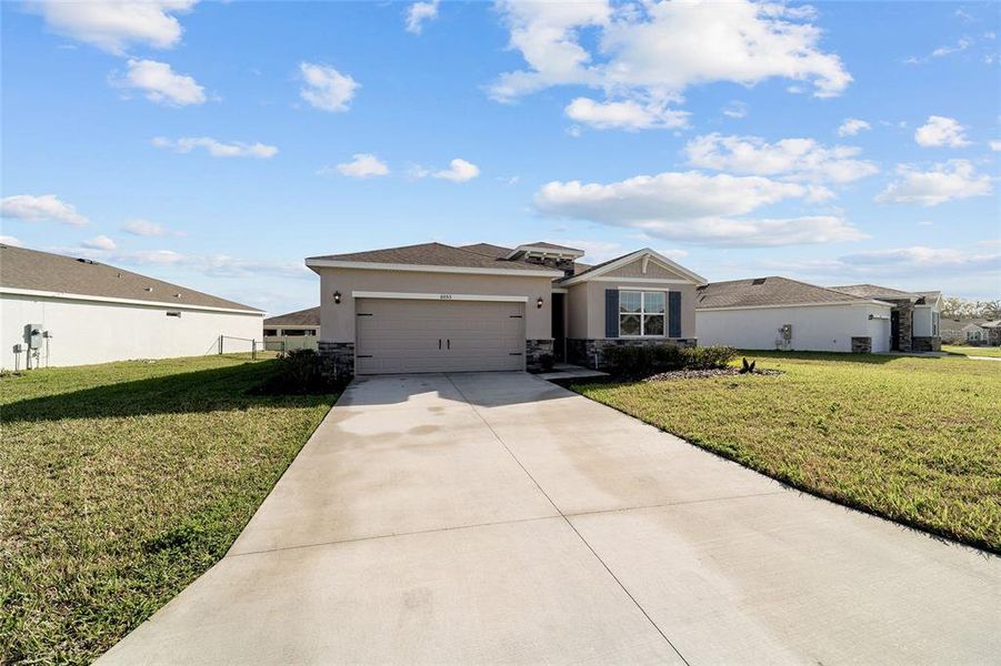 Front exterior of a new home in , Ocala, FL, highlighting curb appeal (Image 30). Front exterior of a new home in , Ocala, FL, highlighting curb appeal (Image 30).