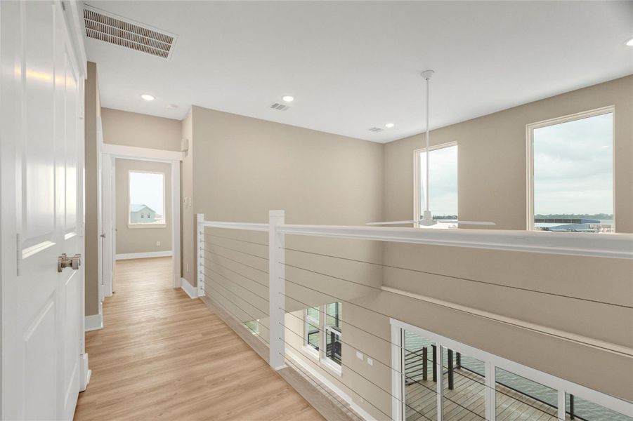 Inside balcony overlooking family room