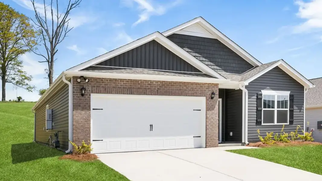Front exterior of a new home in Spring Ridge, Anderson, SC, highlighting curb appeal (Image 2). Front exterior of a new home in Spring Ridge, Anderson, SC, highlighting curb appeal (Image 2).