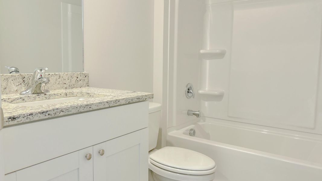 Representative furnished interior of a home built from the Roland by D.R. Horton in Huntington Estates, Millington (Image 9).