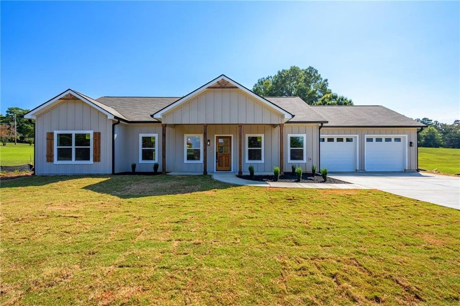 Front exterior of a new home in , Cedartown, GA, highlighting curb appeal (Image 23).