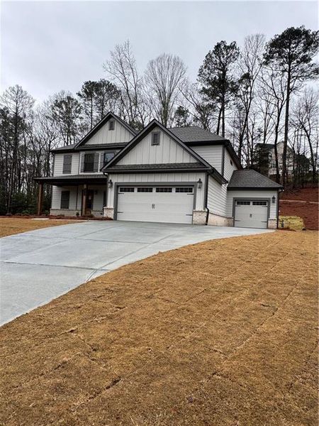 Front exterior of a new home in Red Oak Ridge, Loganville, GA, highlighting curb appeal (Image 3).
