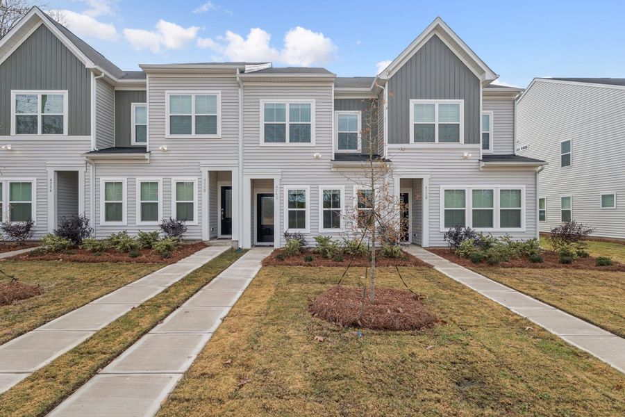 Front exterior of a new home in Lakeview Village, Charlotte, NC, highlighting curb appeal (Image 1). Front exterior of a new home in Lakeview Village, Charlotte, NC, highlighting curb appeal (Image 1).