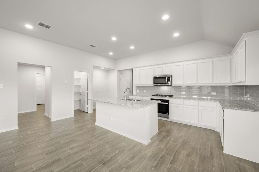 Representative exterior photo of a completed home built from the Jarvis by Impression Homes in Redden Farms, Midlothian, TX (Image 7).