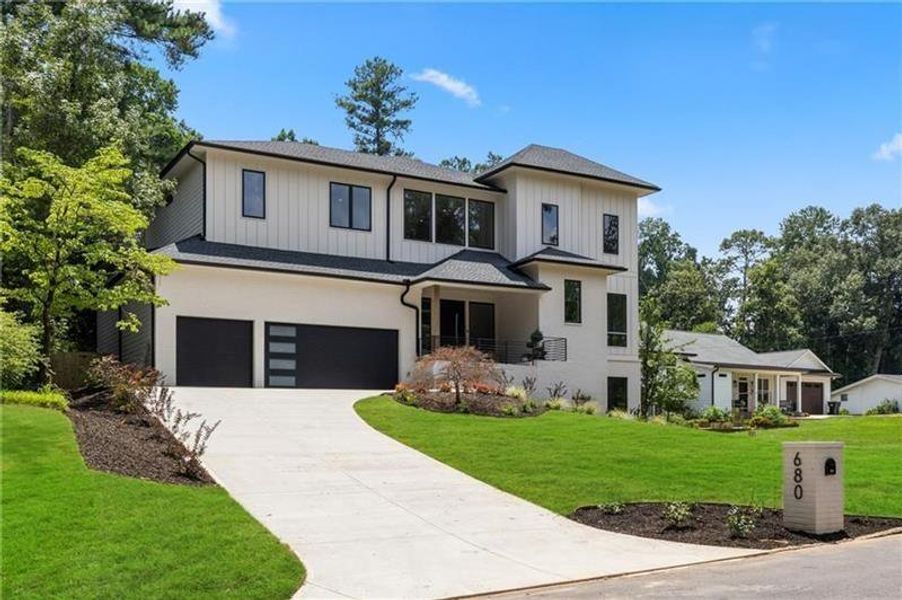 Front exterior of a new home in , Sandy Springs, GA, highlighting curb appeal (Image 25).
