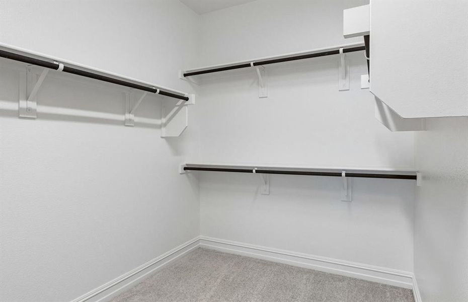 Walk in closet in primary suite
