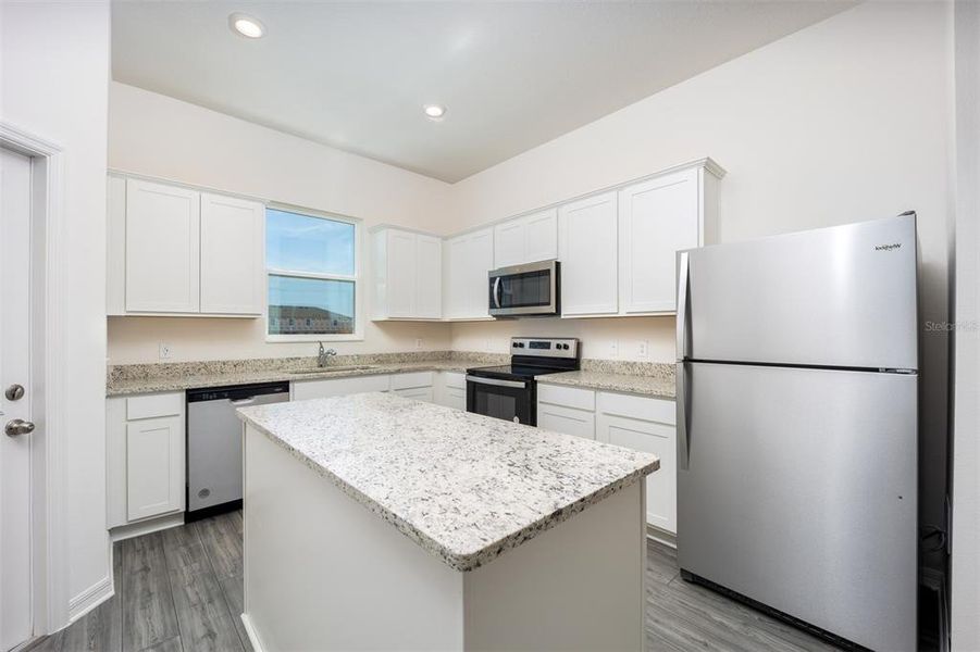 Furnished interior view inside a new home in Sol Vista, Dundee (Image 6).