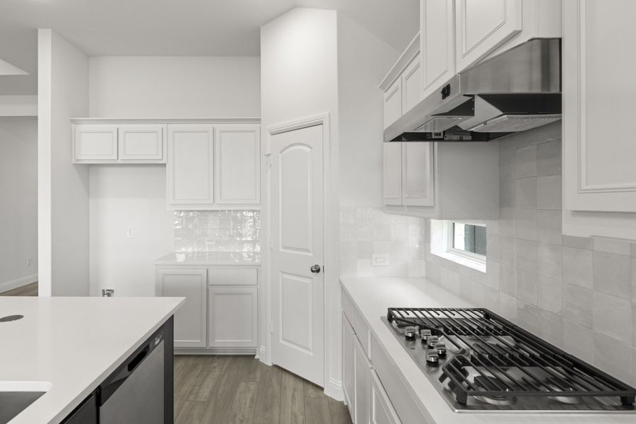 Furnished interior view inside a new home in Creekview Meadows, Pilot Point (Image 6).