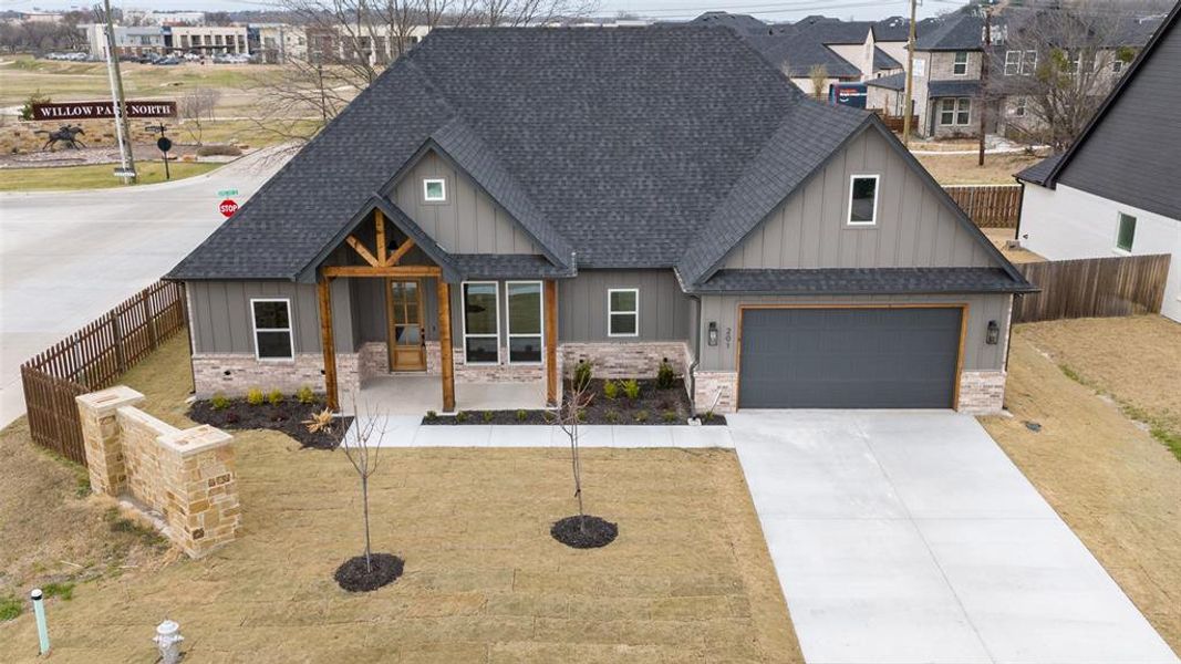 Front exterior of a new home in , Willow Park, TX, highlighting curb appeal (Image 23).