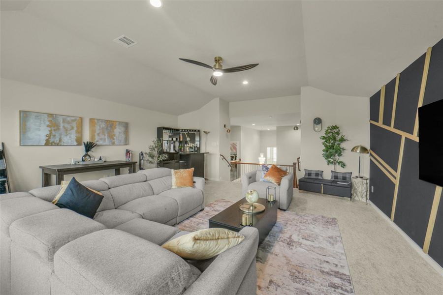 Large upstairs retreat ideal for a playroom, lounge, or entertainment space.
