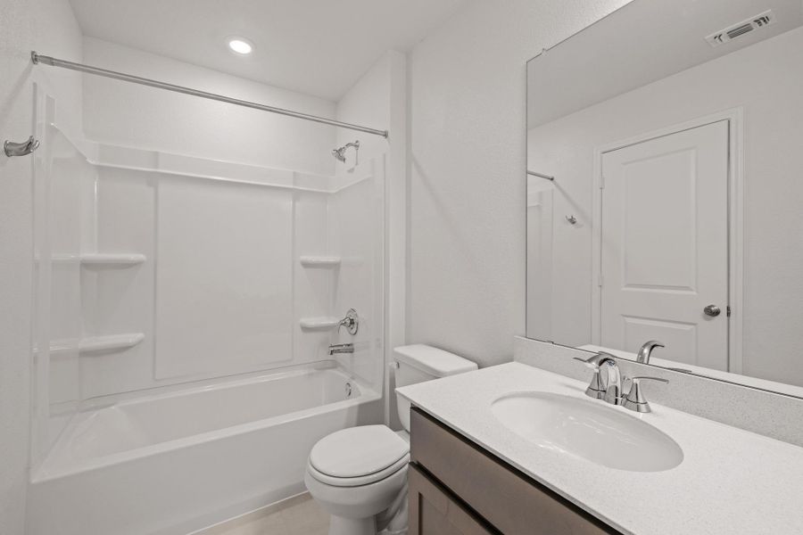 Furnished interior view inside a new home in Sonterra - Cool Water, Jarrell (Image 6).