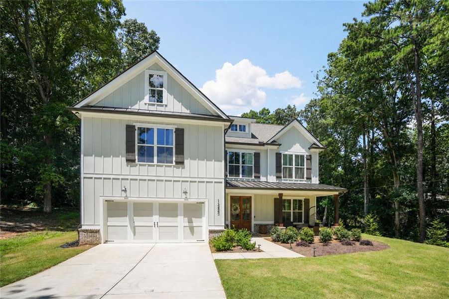 Front exterior of a new home in , Acworth, GA, highlighting curb appeal (Image 25).
