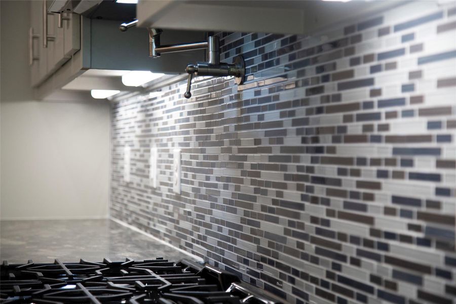 Sample with a pot filler above the stove. Sample with a pot filler above the stove.