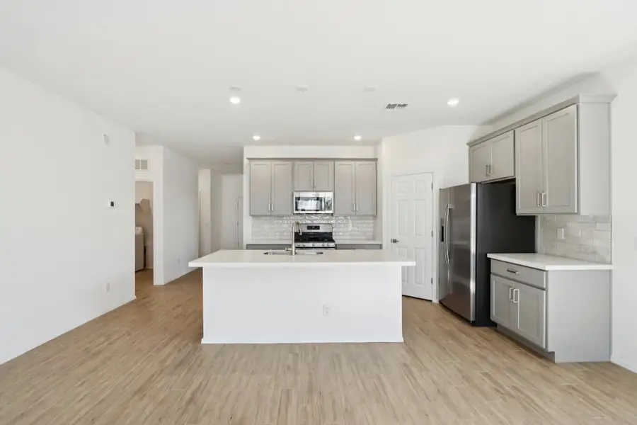 Kitchen featuring the Milan Collection. Not actual home, finishes may vary. Kitchen featuring the Milan Collection. Not actual home, finishes may vary.