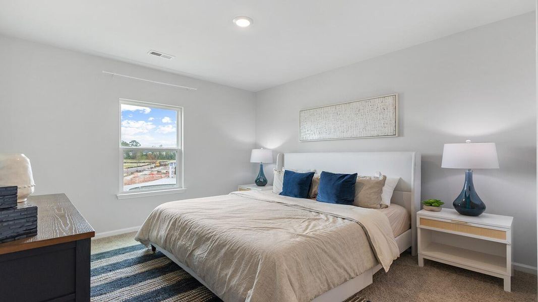 Furnished interior view inside a new home in The Crossing at St. James, Summerville (Image 7).