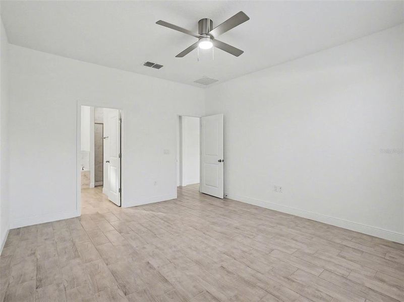 Spacious, unfurnished interior of a new home in Hills of Minneola, Minneola (Image 20). Spacious, unfurnished interior of a new home in Hills of Minneola, Minneola (Image 20).