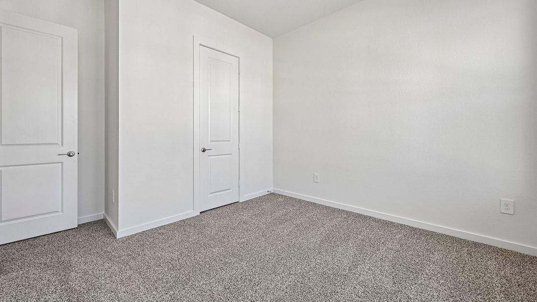 Spacious, unfurnished interior of a new home in The Enclave at Bar W Ranch, Leander (Image 32).